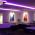 Cove and ceiling in restaurant illuminated by purple coloured LED linear strip lighting
